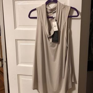 Sexy fitting beige sleeveless top/tunic